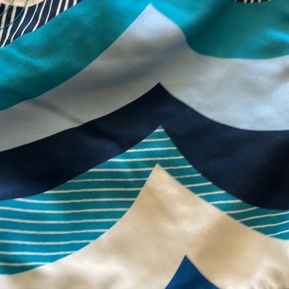 Tea Collection swim trunks + rash guard